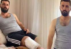 Arkadaşının kürekli müdahalesiyle kendisine saldıran ayıdan kurtuldu
