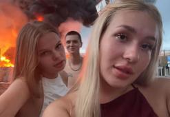Yanan petrol deposunun önünde video çeken iki kadın gözaltına alındı