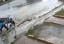 Lise öğrencisi, bisikletiyle yağmur suyu dolu çukura düştü