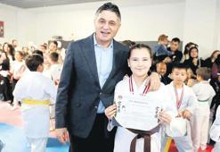 75 sporcu yeni kuşağına kavuştu