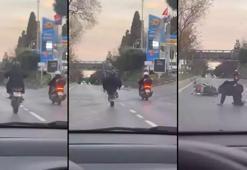 Üsküdar'da tek teker ilerlemeye çalışan motosikletli yola savruldu