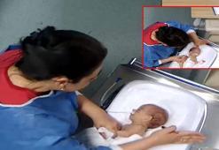 Bu görüntüler infial yaratmıştı! Cani hemşire polise teslim oldu