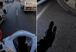 Seyir halinde, kamyonetten sarkan ipe dolanan motosikletli dehşeti yaşadı