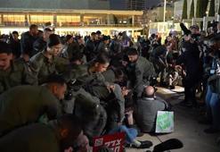 İsrail polisi savaş karşıtlarına saldırdı! Tel Aviv'deki gösteride Netanyahu ve Trump'a büyük öfke