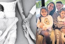 Üçüncü çocuklarını kucakladılar