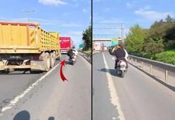 Ataşehir TEM’de motosiklet üstünde kavga! Kadını saçından çekti, kamyonun altında kalmaktan son anda kurtuldu