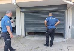 Hırsızlık ihbarına giden polis garaj kapısı açıldığında şaşkına döndü