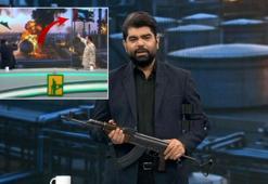 Canlı yayında silah çekti! İran TV'sinde şoke eden anlar... BAE bayrağı hedef alındı