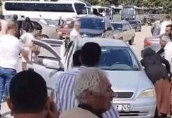 Aralarında husumet bulunan iki aile cenazede karşılaştı! 'Bu nasıl çatışma? Yat, yat, yat...'