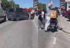 Kartal'da motokuryeyle kavga ederken aracını geri viteste unutan sürücü kaza yaptı