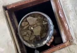 Samsun'da eski binaya polis baskını! Halıyla gizlenen kaçak define kazısı ortaya çıktı