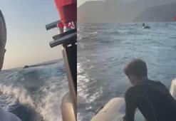 Lastik botla denizde mahsur kalan kişinin kurtarılma anı kamerada