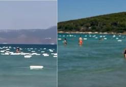 Çeşme’de denizden gelen gizem! Yüzlerce kutu deniz yüzeyini kapladı