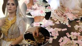 Gelinin takıları özel koruma ile salona getirildi! O kadar çok altın takıldı ki hareket edemedi