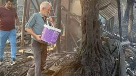 70 yaşındaki Kemal amca orman yangınına direndi