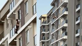 7. katın penceresinde dehşet! Genç kadın ayaklarından yakalandı