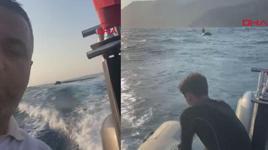 Lastik botla denizde mahsur kalan kişinin kurtarılma anı kamerada