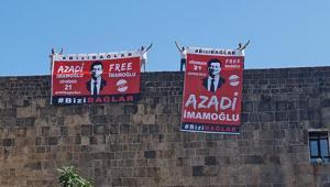 Diyarbakırda surlara asılan İmamoğlu pankartlarına polis müdahalesi