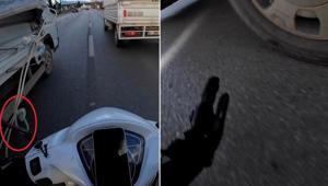 Seyir halinde, kamyonetten sarkan ipe dolanan motosikletli dehşeti yaşadı