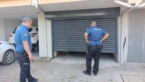 Hırsızlık ihbarına giden polis garaj kapısı açıldığında şaşkına döndü
