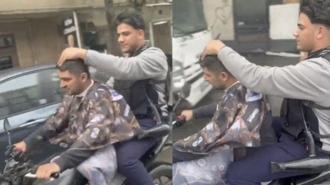 Sultangazi'de seyir halindeki motosiklet üzerinde tıraş