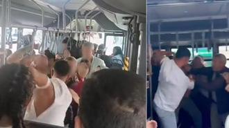 Otobüste taciz iddiası! Tekme-yumruk birbirlerine girdiler