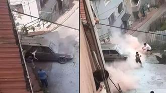 Aracının alev almasına kızıp, camlarını ve aynalarını kırdı