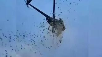 Vasiyetini yerine getirdiler: Helikopterden 5 bin dolar para saçtılar!