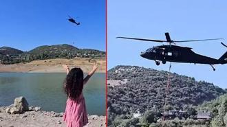 Skorsky tipi askeri helikopteri görünce elini kaldırdı! Küçük kıza unutulmaz anı