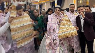 Görülmemiş düğün! Gelin ve damada paradan yelek, dolarlı taç takıldı