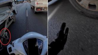 Seyir halinde, kamyonetten sarkan ipe dolanan motosikletli dehşeti yaşadı