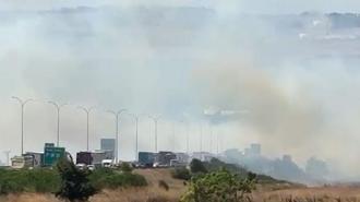 Silivri'de tarlada başlayan yangın rüzgarın etkisiyle büyüdü! TEM otoyolunda trafik durdu