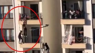 Balkondan düşmek üzere olan çocuğu balkondan tırmanarak kurtardı