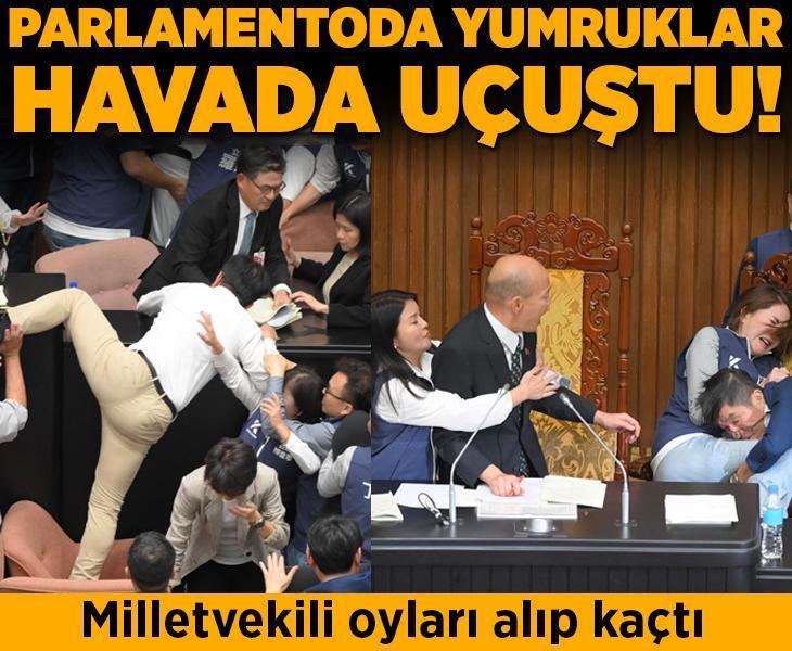 Tayvan Parlamentosu'nda yumruklar havada uçuşu! Milletvekili oyları alıp kaçtı