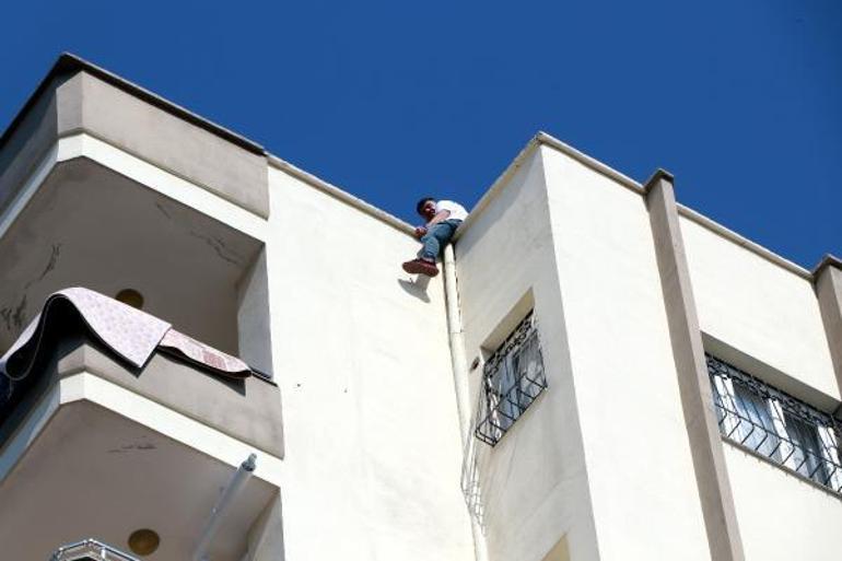 Eşi reddedince intihara kalkıştı, vatandaşlar görüntülemek için birbiriyle yarıştı