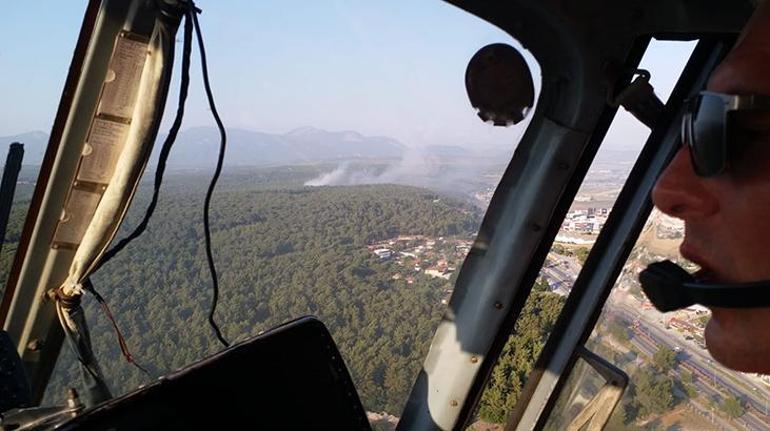 İzmirde orman yangını Helikopterlerle müdahale edildi