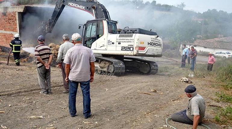 Ürünlerinin yanmasını gözyaşları dökerek izledi