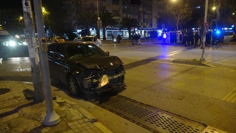 Otomobille çarpışan ambulans yan yattı