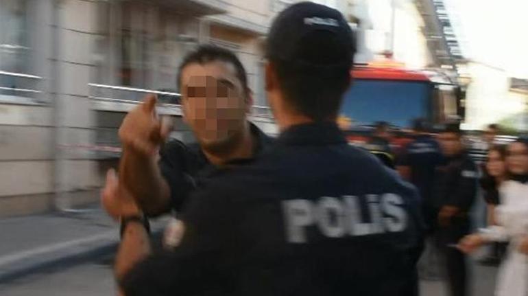 Yangın haberinde çekim yapan DHA muhabirine polisten saldırı