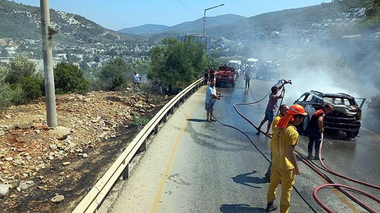 Otomobildeki yangın, ormana sıçramadan söndürüldü