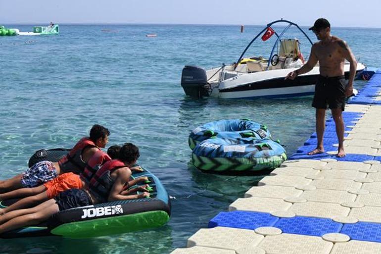 Emre Altuğ, Kuzey ve Uzay ile Çeşmede Çocuklarıyla su sporları yaptı