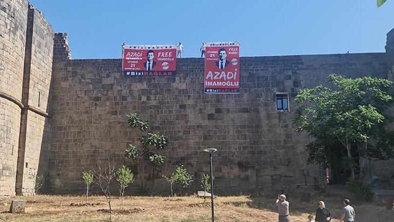 Diyarbakırda surlara asılan İmamoğlu pankartlarına polis müdahalesi