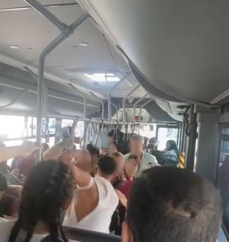 Otobüste taciz iddiası Tekme-yumruk birbirlerine girdiler