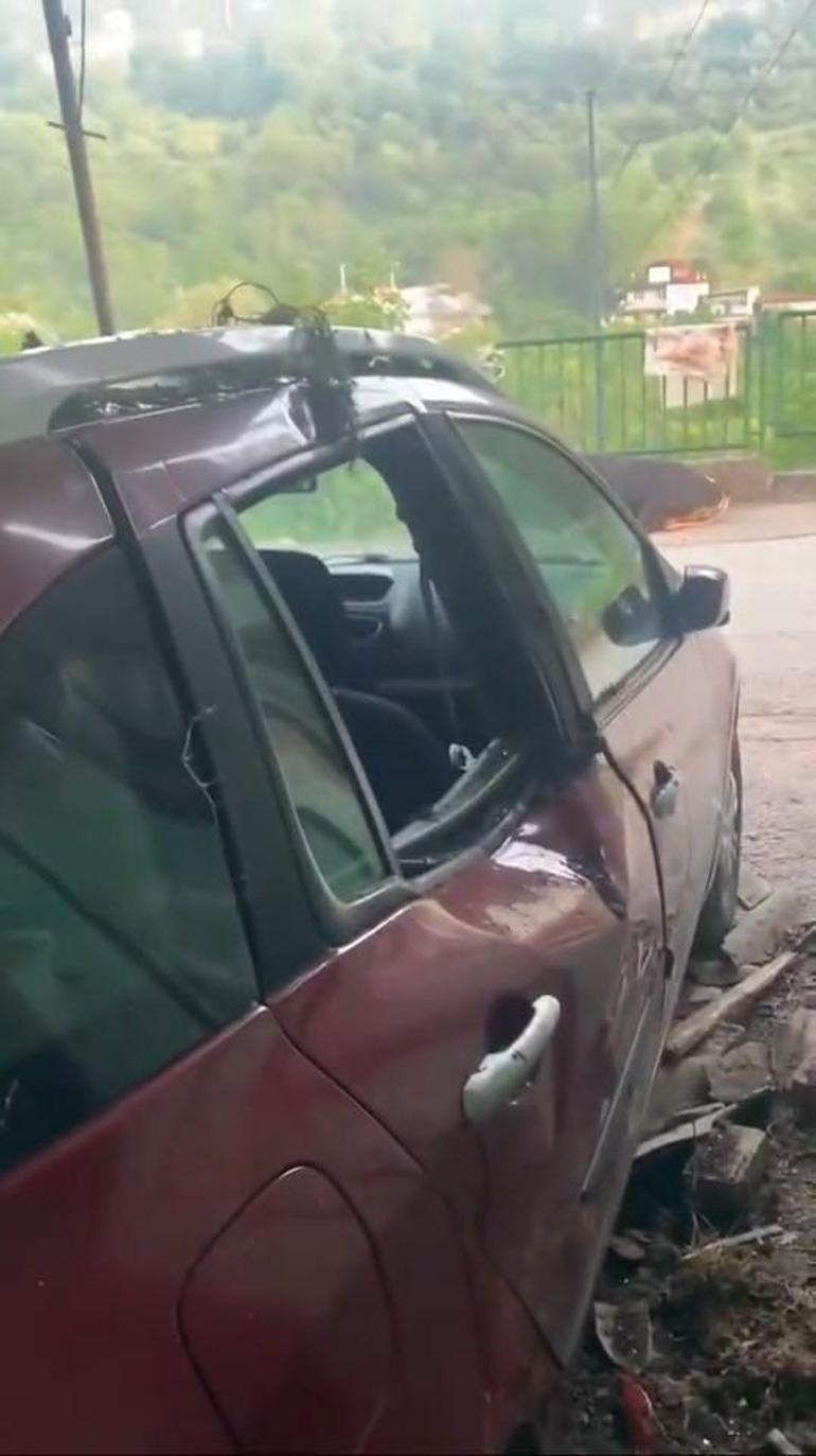 Garaj çatısına çıkan kurbanlık boğa, otomobilin üzerine düştü