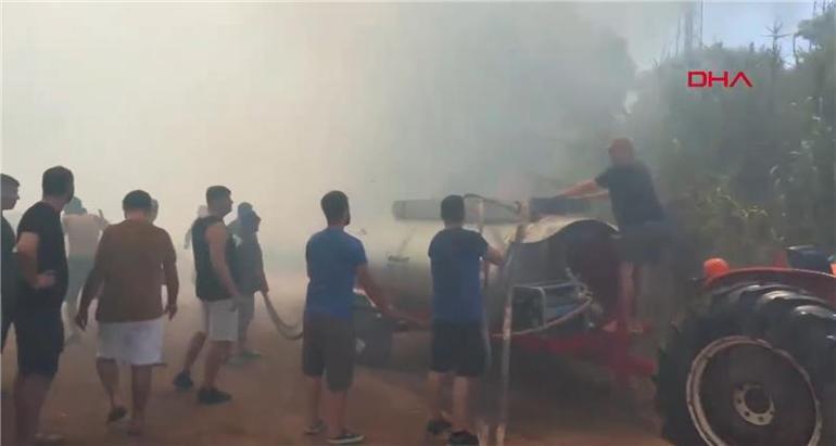 Son dakika: Antalyada orman yangını Turistler alevlere müdahale etti