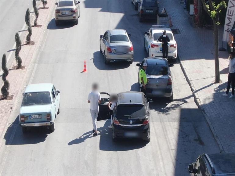 Ehliyetsiz sürücü eşiyle yer değiştirdi ama drondan kaçamadı