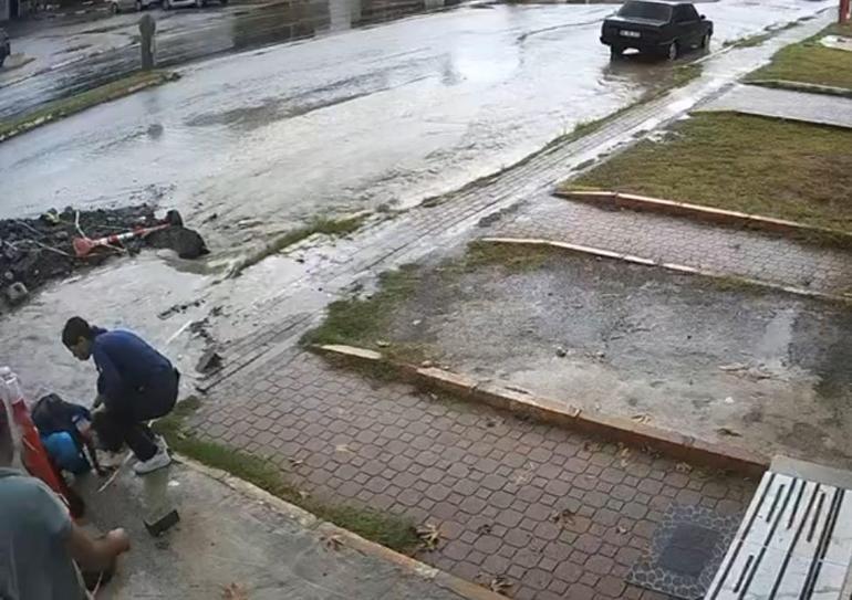 Hatayda kan donduran görüntü Bisikletiyle yağmur suyu dolu çukura düştü