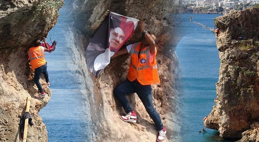 Atatürk posterini falezlere asmak isterken zor anlar yaşadı
