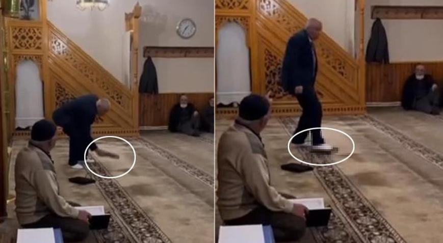 Kuran-ı Kerimi 3 kez kez öptü, sonra ayağıyla bastı Tepki çeken görüntü için karar