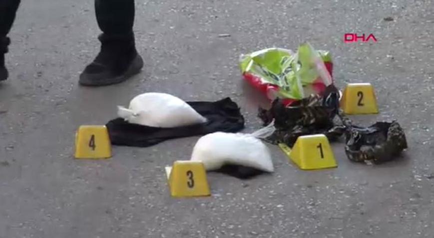 Kiliste polisin fark ettiğini anlayınca poşeti bırakıp kaçtı